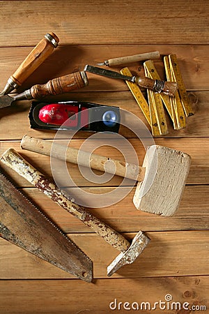 Carpenter tools saw hammer wood tape plane gouge Stock Photo