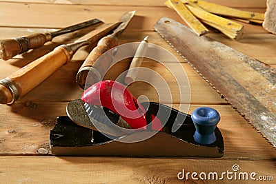 Carpenter tools saw hammer wood tape plane gouge Stock Photo