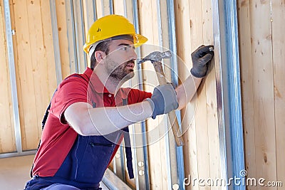 Carpenter using hammer Stock Photo