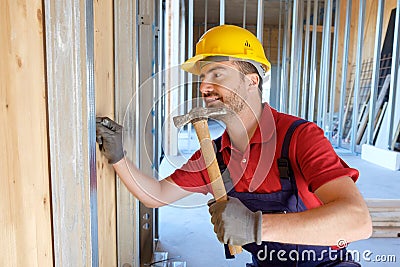 Carpenter using hammer Stock Photo