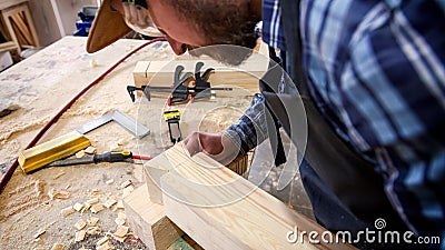 Experienced carpenter in workshop Stock Photo