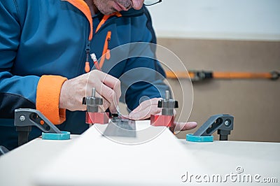 Carpenter working in a carpentry shop.Small business concept Stock Photo