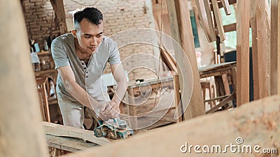 Carpenters work using electric wood dowels Stock Photo