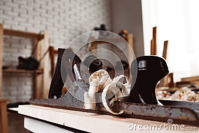 Carpentry plane tool for woodworking in workshop Stock Photo