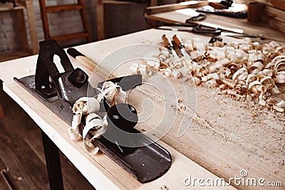 Carpentry plane tool for woodworking in workshop Stock Photo