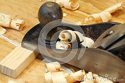 Carpentry plane on workbench Stock Photo