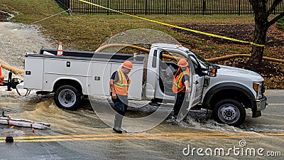 Carrboro, NC, US- November 5, 2018: Firemen and Water Authority Editorial Stock Photo