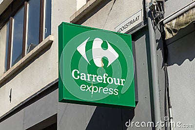 Carrefour Express store logo sign. Carrefour is a French group, and a leading global retailer. Editorial Stock Photo