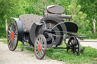 Carriage or brougham - an outdated means of transportation for a team of horses Stock Photo