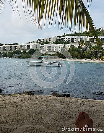 Carribean sandy Beach with boat palm tree Editorial Stock Photo