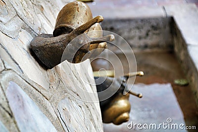 Fountain with decorative metal snails in Carricola square Editorial Stock Photo