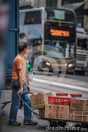 Carrier Push A Shipping Cart Trolley Editorial Stock Photo