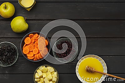Carrot, apples, honey, dried prunes and cranberry Stock Photo