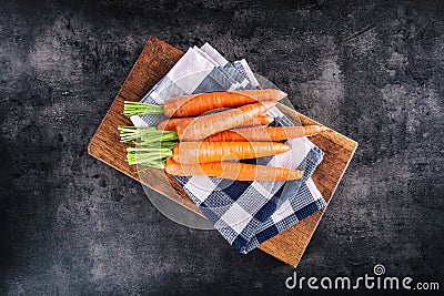 Carrot. Fresh Carrots bunch. Baby carrots. Raw fresh organic orange carrots. Healthy vegan vegetable food Stock Photo