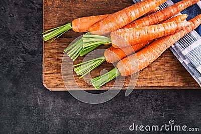 Carrot. Fresh Carrots bunch. Baby carrots. Raw fresh organic orange carrots. Healthy vegan vegetable food Stock Photo
