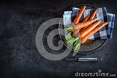 Carrot. Fresh Carrots bunch. Baby carrots. Raw fresh organic orange carrots. Healthy vegan vegetable food Stock Photo