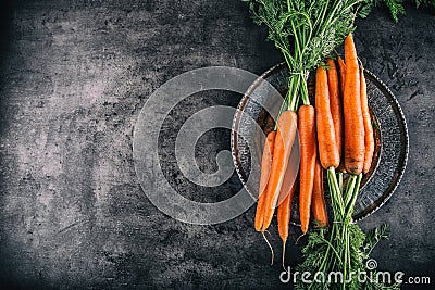 Carrot. Fresh Carrots bunch. Baby carrots. Raw fresh organic orange carrots. Healthy vegan vegetable food. Fresh Vegetable Stock Photo