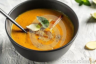 Carrot ginger soup, Food recipe background. Close up Stock Photo