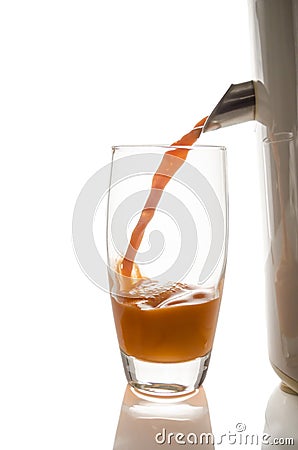Carrot juice with a juicer Stock Photo