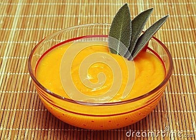 Carrot puree and sage Stock Photo