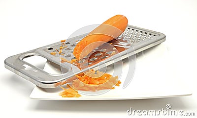 Carrot rasping Stock Photo