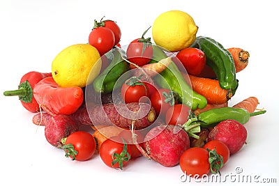 carrot tomato radish lemon pepper isolated on white background. Stock Photo