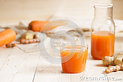 Carrots, ginger, turmeric detox fresh juice Stock Photo