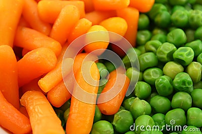 Carrots and green peas Stock Photo