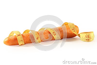 Carrots with a metre-stick. Stock Photo