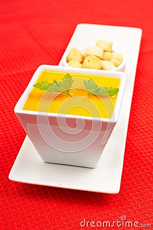 Carrots puree and bread croutons Stock Photo