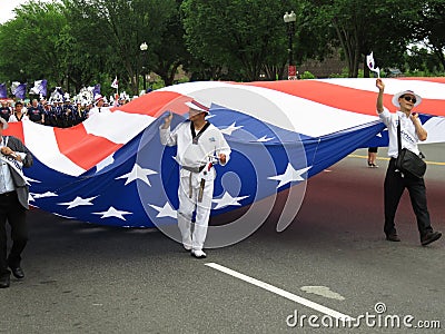 Carrying a Large American Flag Editorial Stock Photo