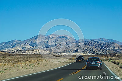 Cars driving through death valley Editorial Stock Photo