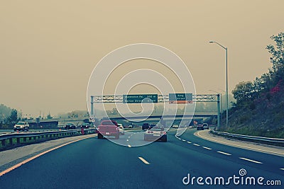 Cars on freeway road at evening in city country. Stock Photo