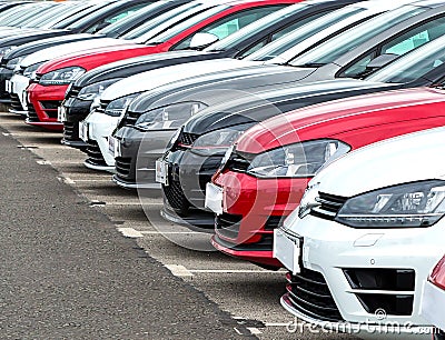 Cars on Garage Forecourt Stock Photo