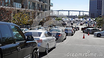 San Diego CA USA - January 27 2020: Cars line up to enter Covid-19 vaccination superstation at Petco Park Editorial Stock Photo