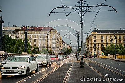 Cars moving down the street of Budapest Editorial Stock Photo