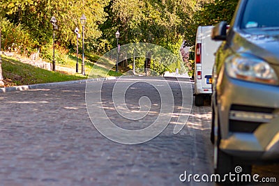 Cars parked along the road near the Grunde in Luxembourg City Stock Photo