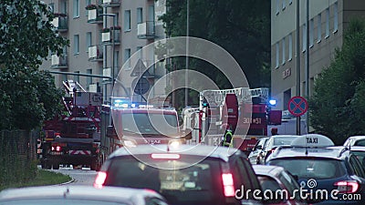 Cars Running with Lights On in the Rain Editorial Stock Photo