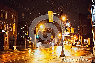 Cars on the street at night with snow Editorial Stock Photo