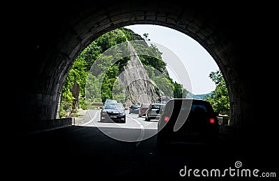 Cars on the street, in the road tunnel. Photo inside the road tunnel. Editorial Stock Photo