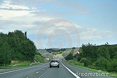 Cars on the street. Urbanization, doads and transport infrastructure. Editorial Stock Photo