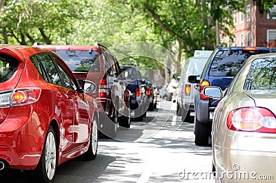 Cars Stuck in Traffic in City Street Stock Photo