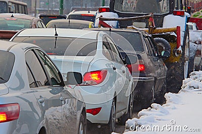 Cars stuck in traffic on a winter street Stock Photo