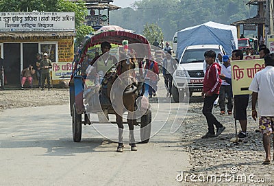 Cart driver with horse riding on the street Editorial Stock Photo