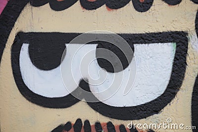 Cartoon eyes painted on a wall Editorial Stock Photo