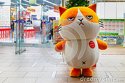 Cartoon mascot cat in front of Bic Camera department store in Tokyo Editorial Stock Photo