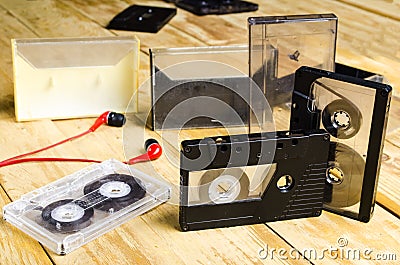 The cartridge for the tape recorder on a wooden table Stock Photo