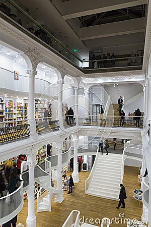 Tourists and local people seeking books in Carturesti Library Editorial Stock Photo