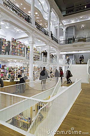 Tourists and local people seeking books in Carturesti Library Editorial Stock Photo