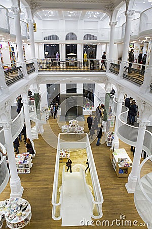 Tourists and local people seeking books in Carturesti Library Editorial Stock Photo